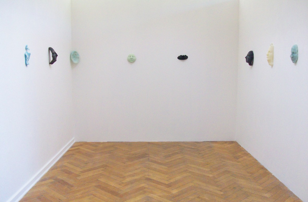 installation with waxfaces